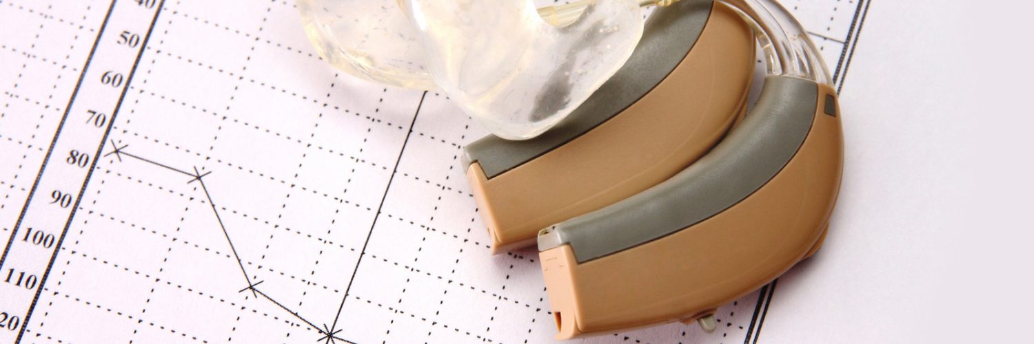 1244533_medical-chart-and-hearing-aid